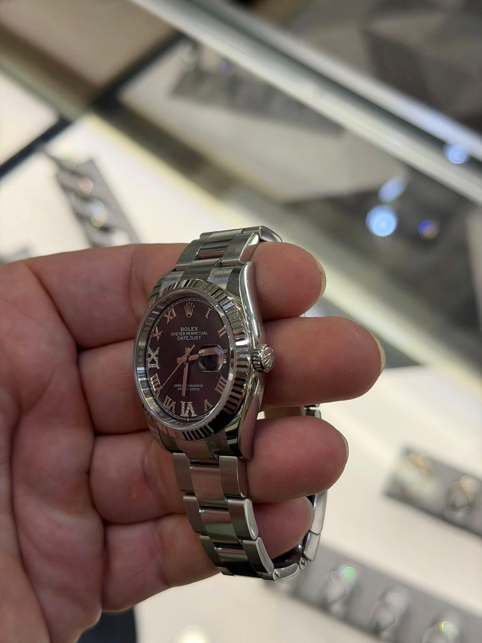 May be an image of wrist watch