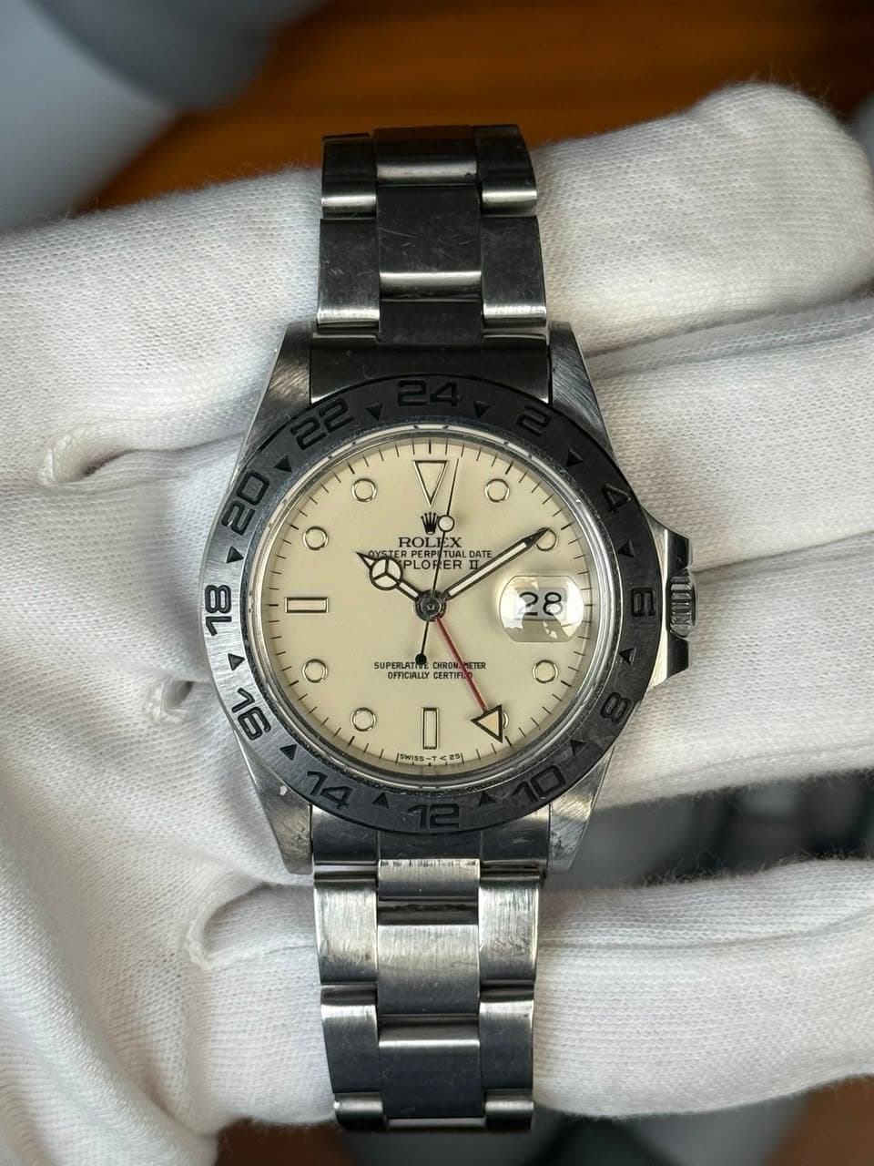May be an image of wrist watch and text