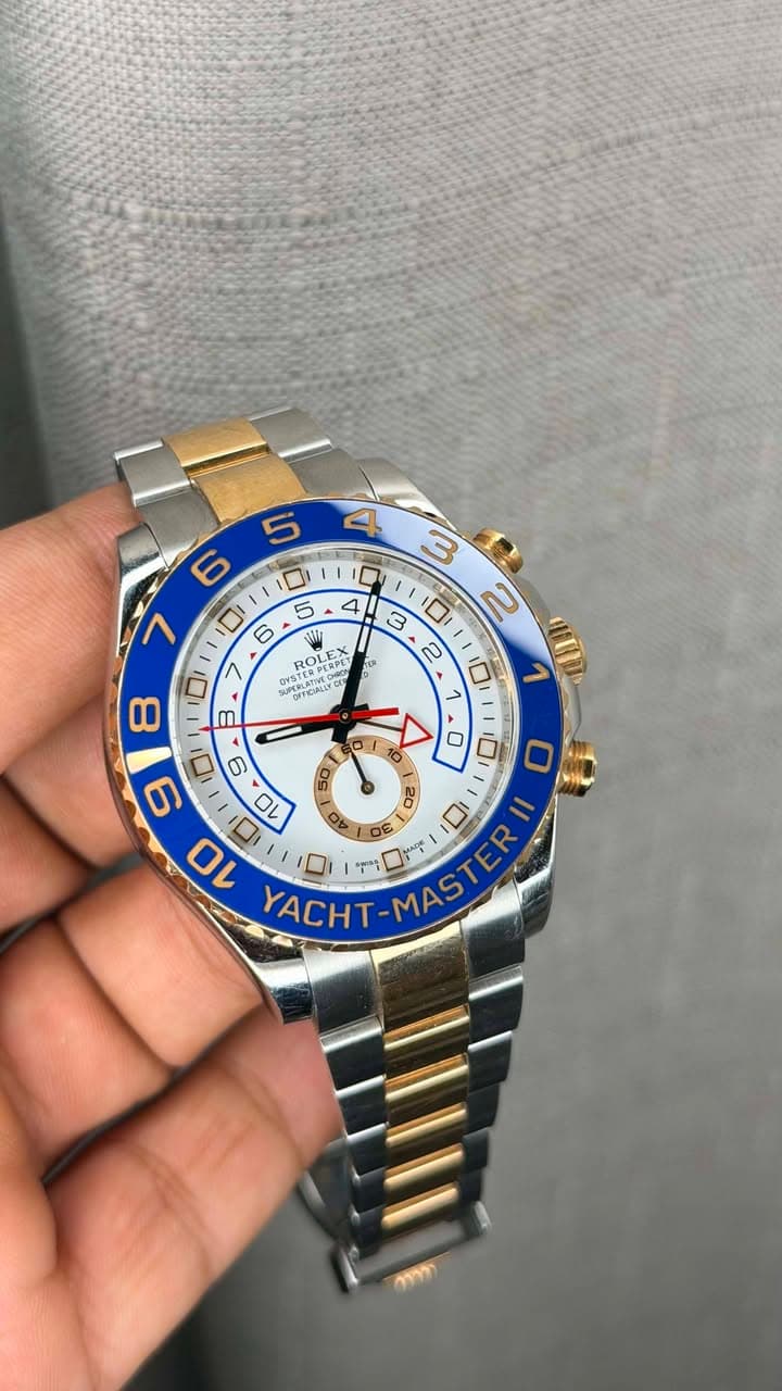 May be an image of wrist watch and text