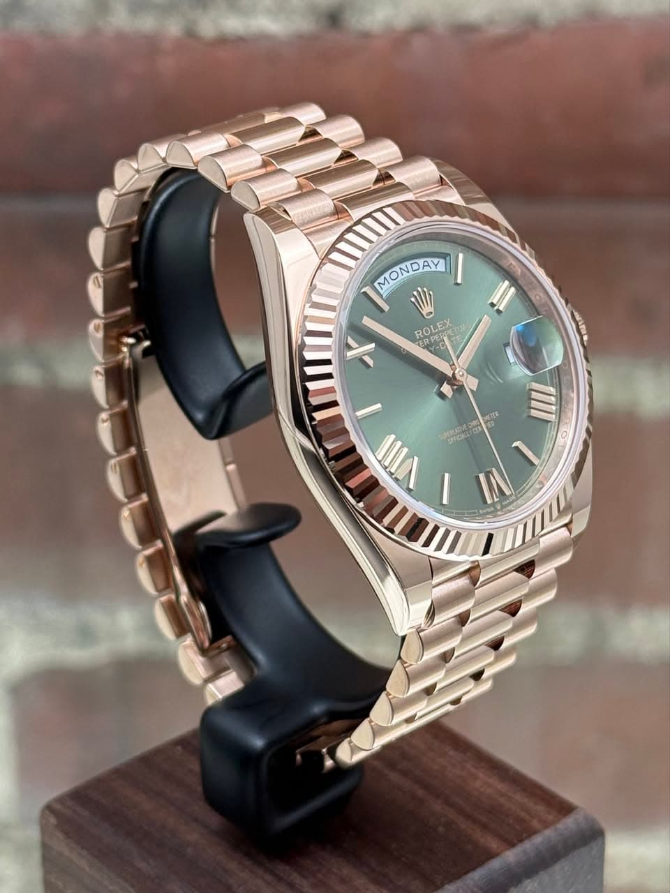 May be an image of wrist watch, jewelry and text
