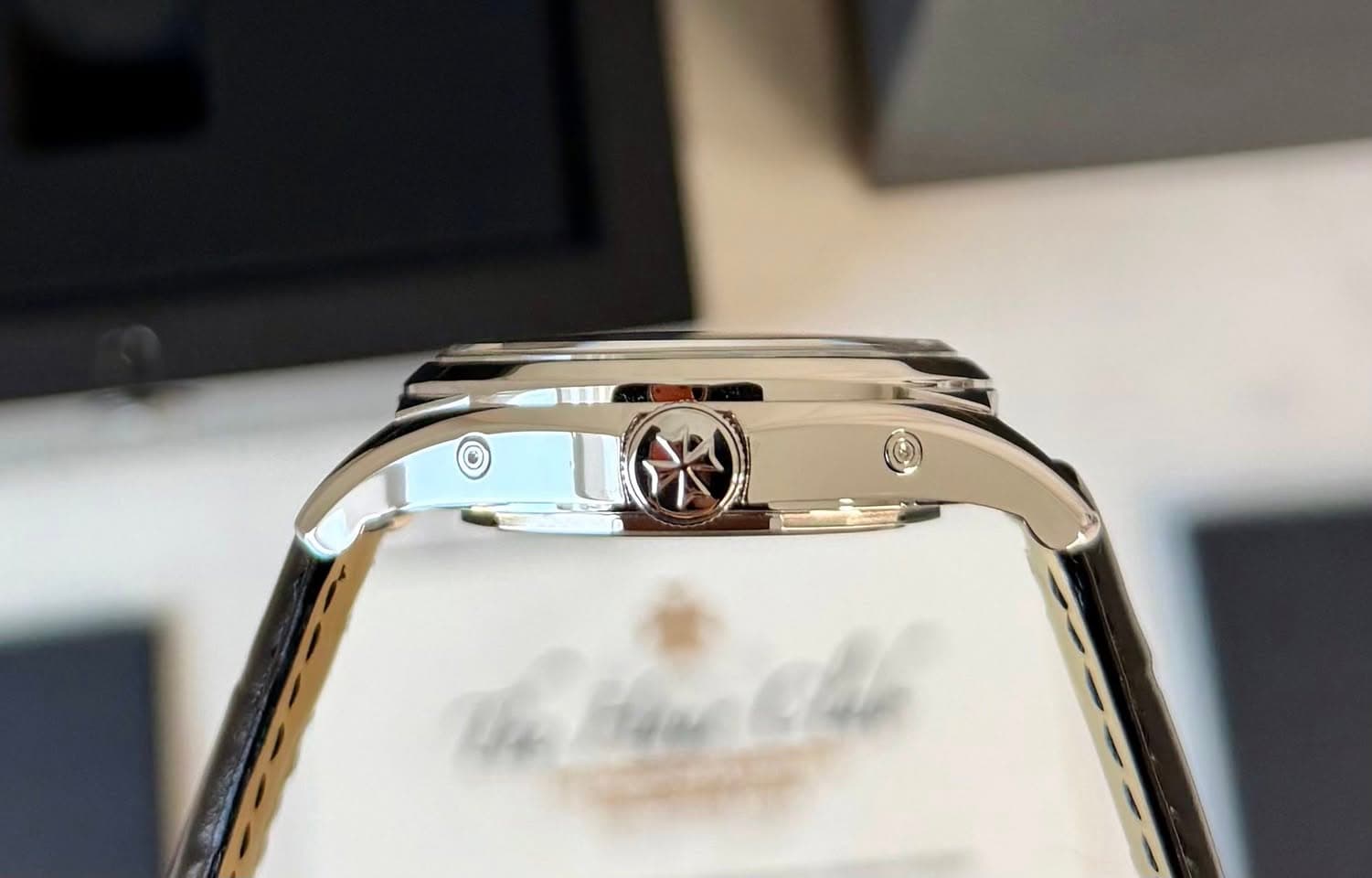 May be an image of wrist watch and text
