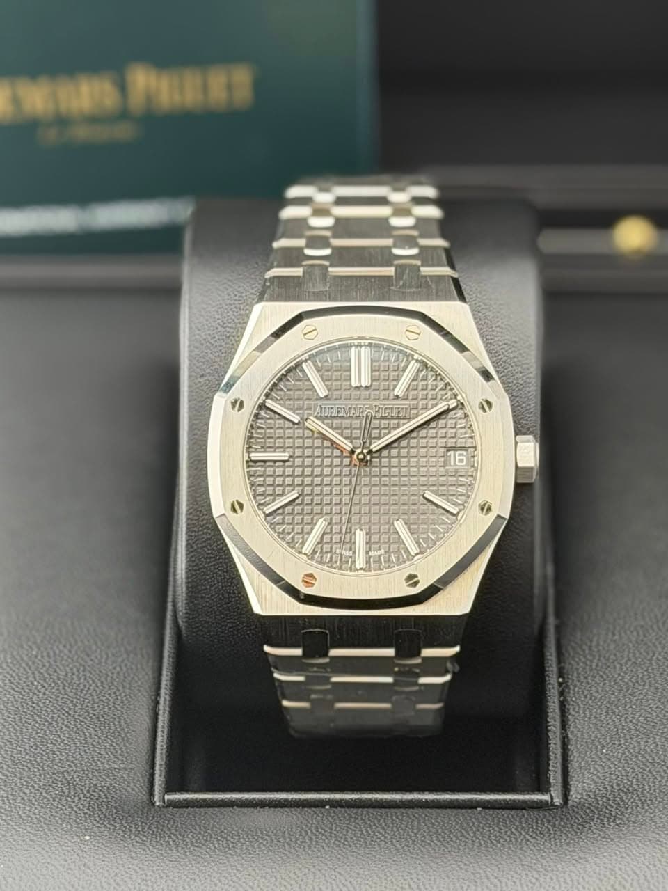 May be an image of wrist watch and text