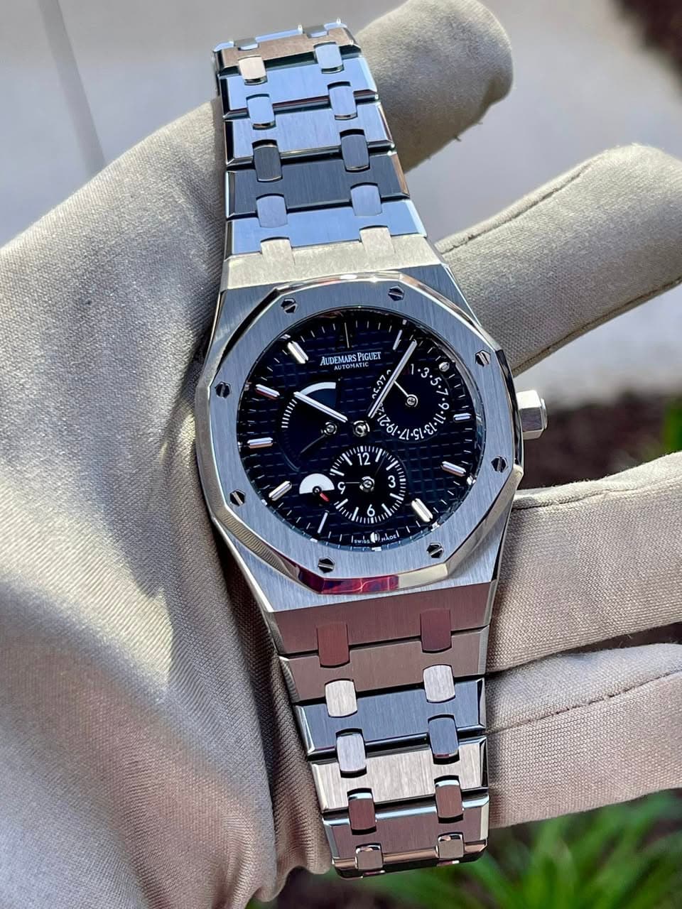May be an image of wrist watch and text