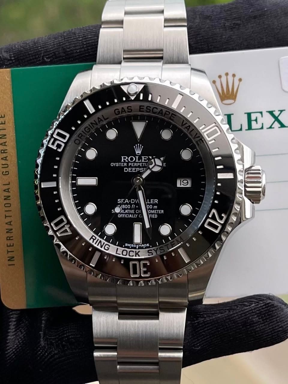 May be an image of wrist watch and text that says '50 ROLE OYSTER OYSTERPERPE PERPET DEEPS 10 LEX 19 SF.A-D 2800/ RLATIVE RLATIVE OFFICI OFFICIALLY ALIY LER 00 OMETER RED 40 swss ተ…