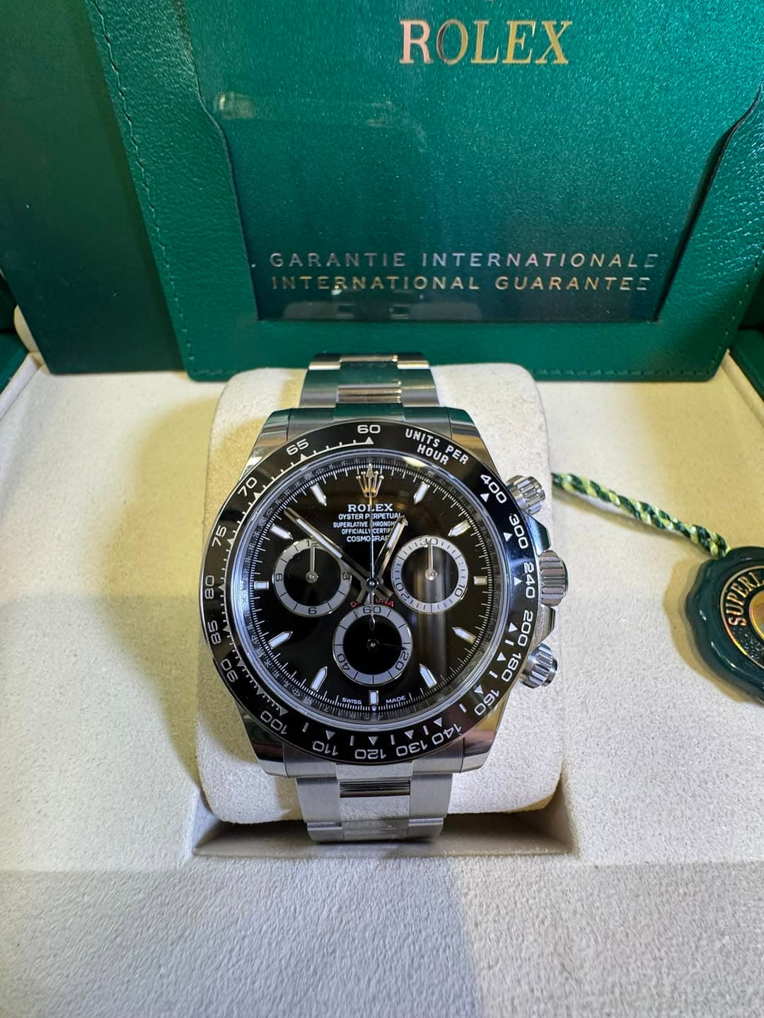 May be an image of wrist watch and text