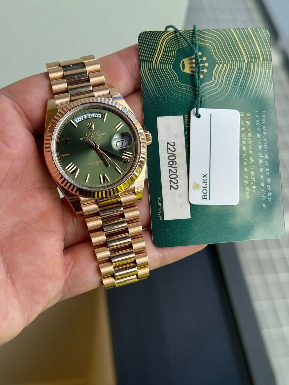 May be an image of wrist watch and text