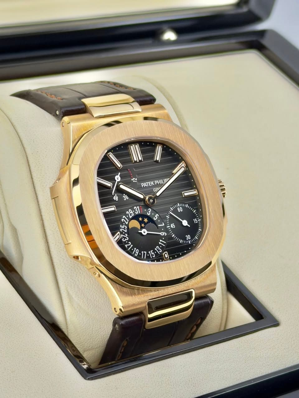May be an image of wrist watch and text