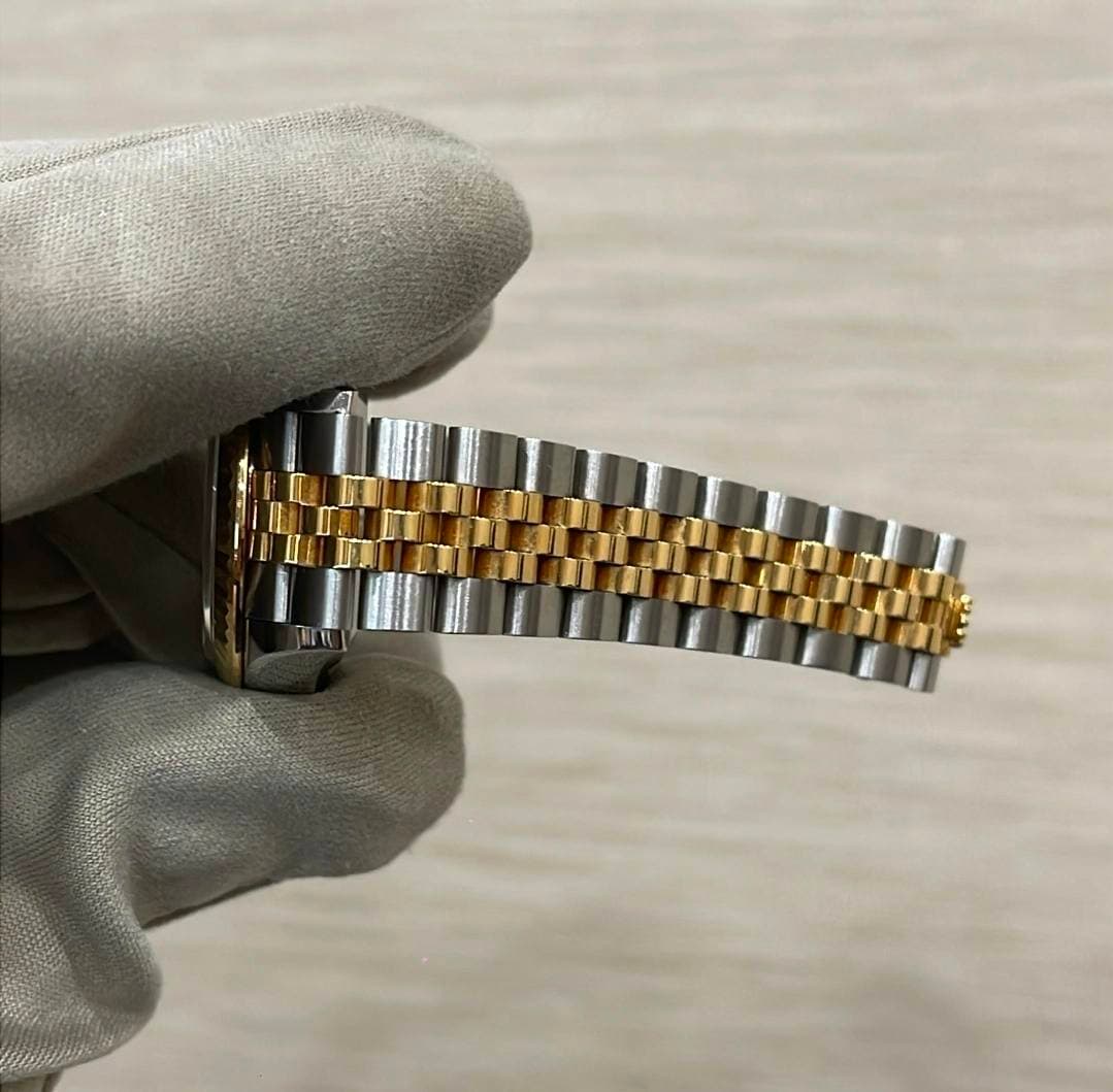 May be an image of wrist watch