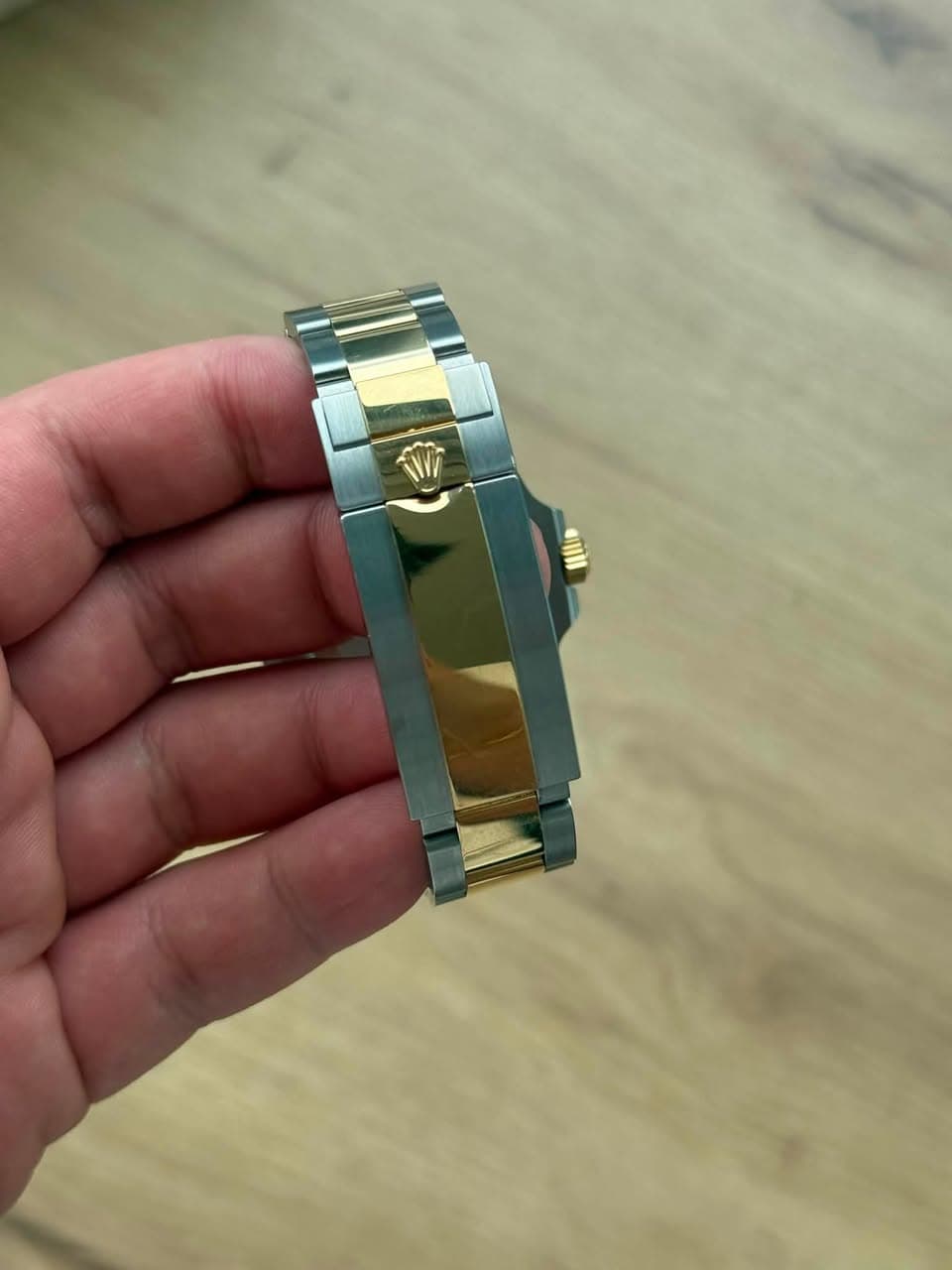 May be an image of wrist watch