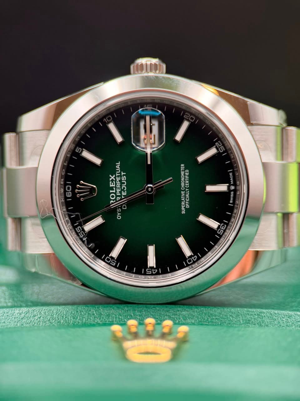 May be an image of wrist watch and text