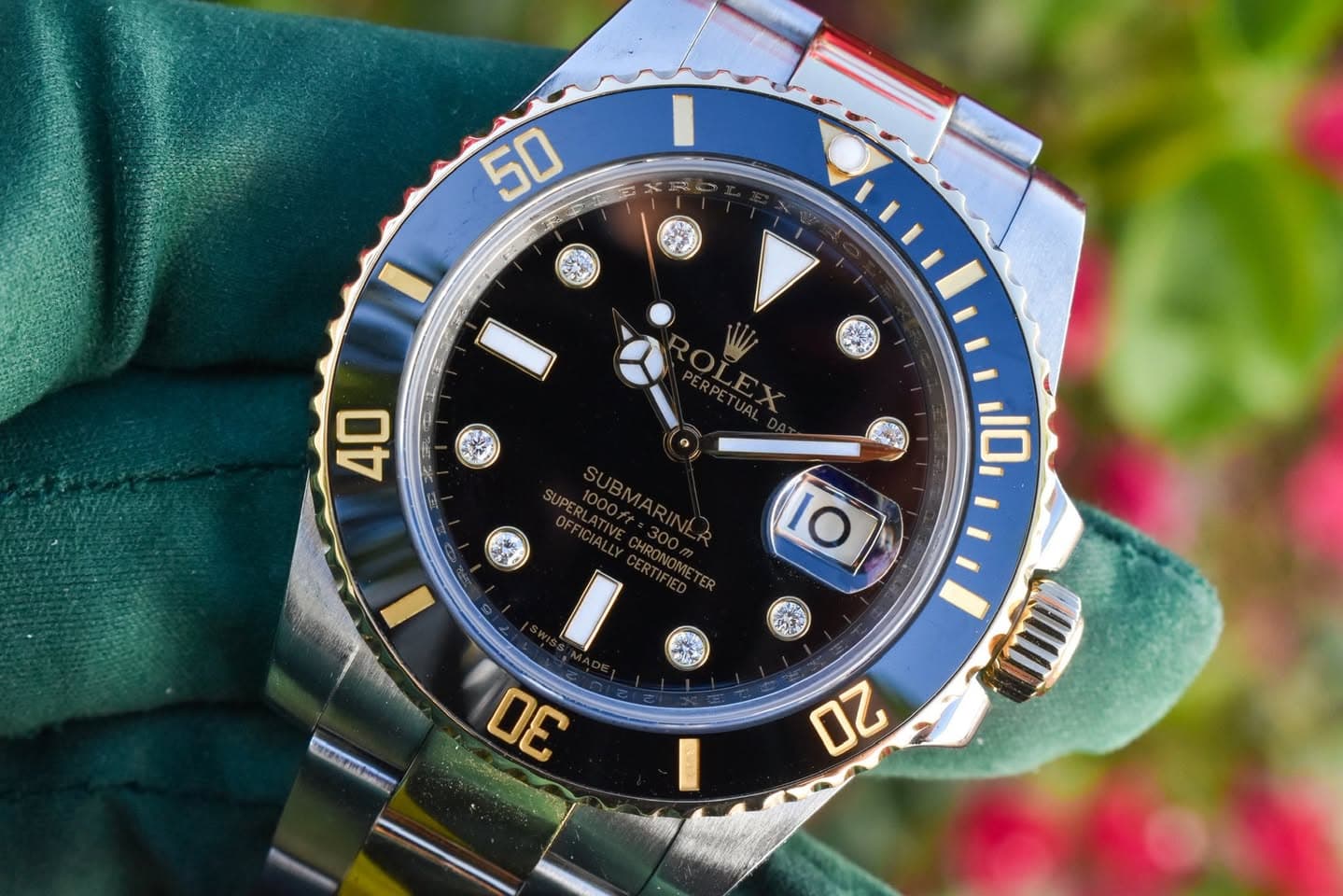 May be an image of wrist watch and text