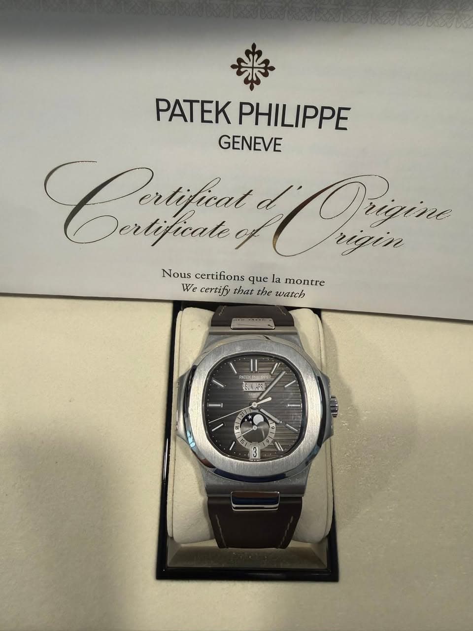 May be an image of wrist watch and text