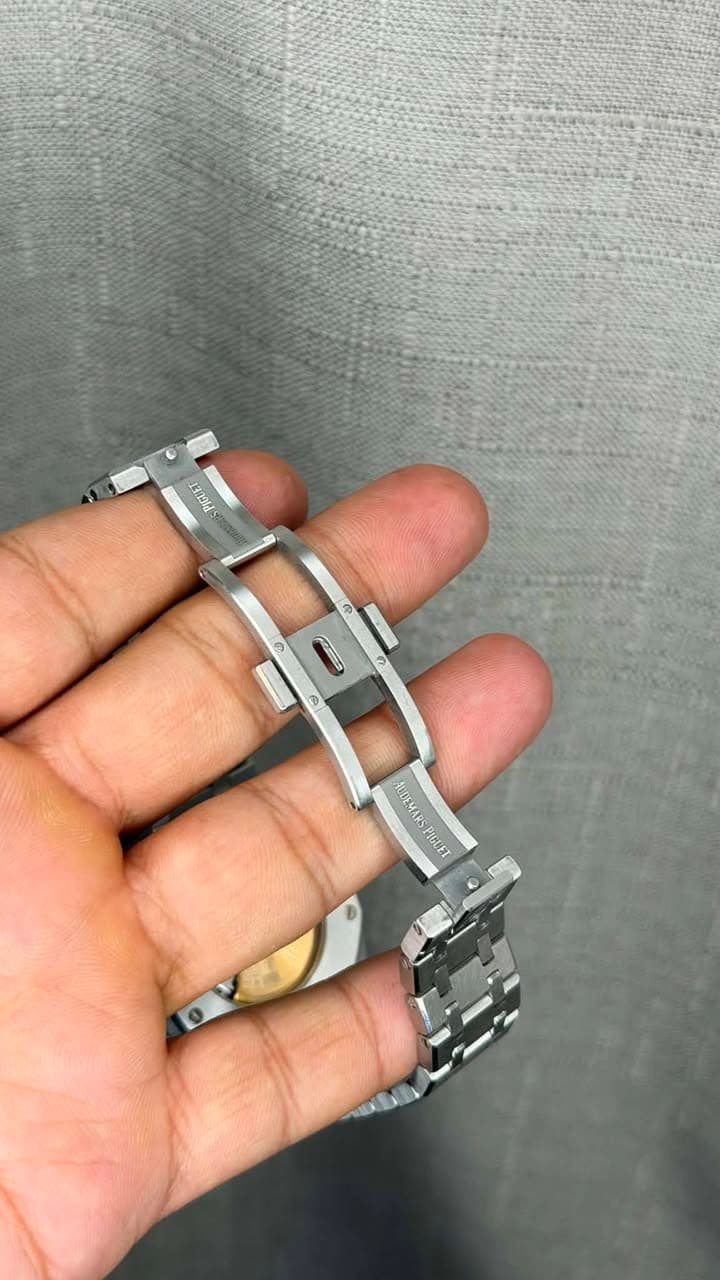 May be an image of wrist watch