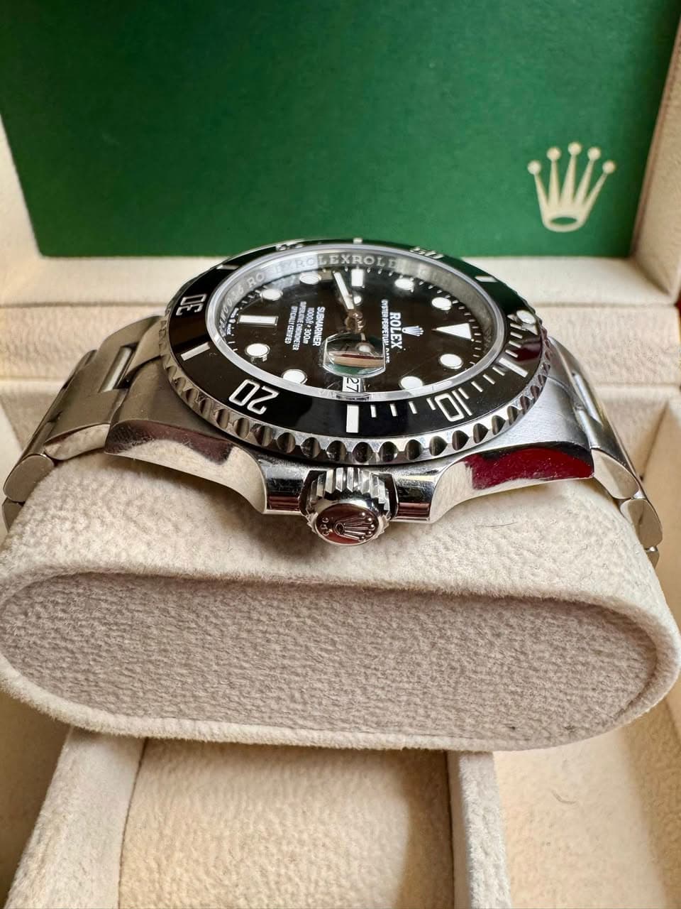 May be an image of wrist watch and text