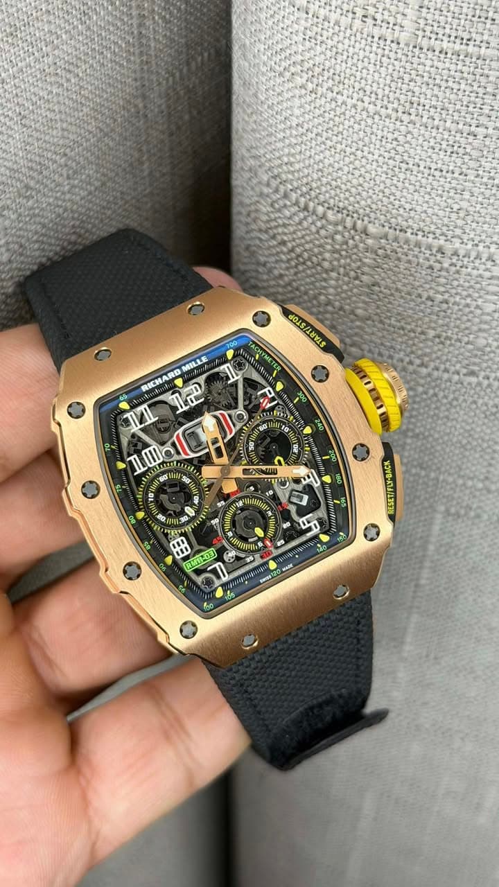 May be an image of wrist watch and text