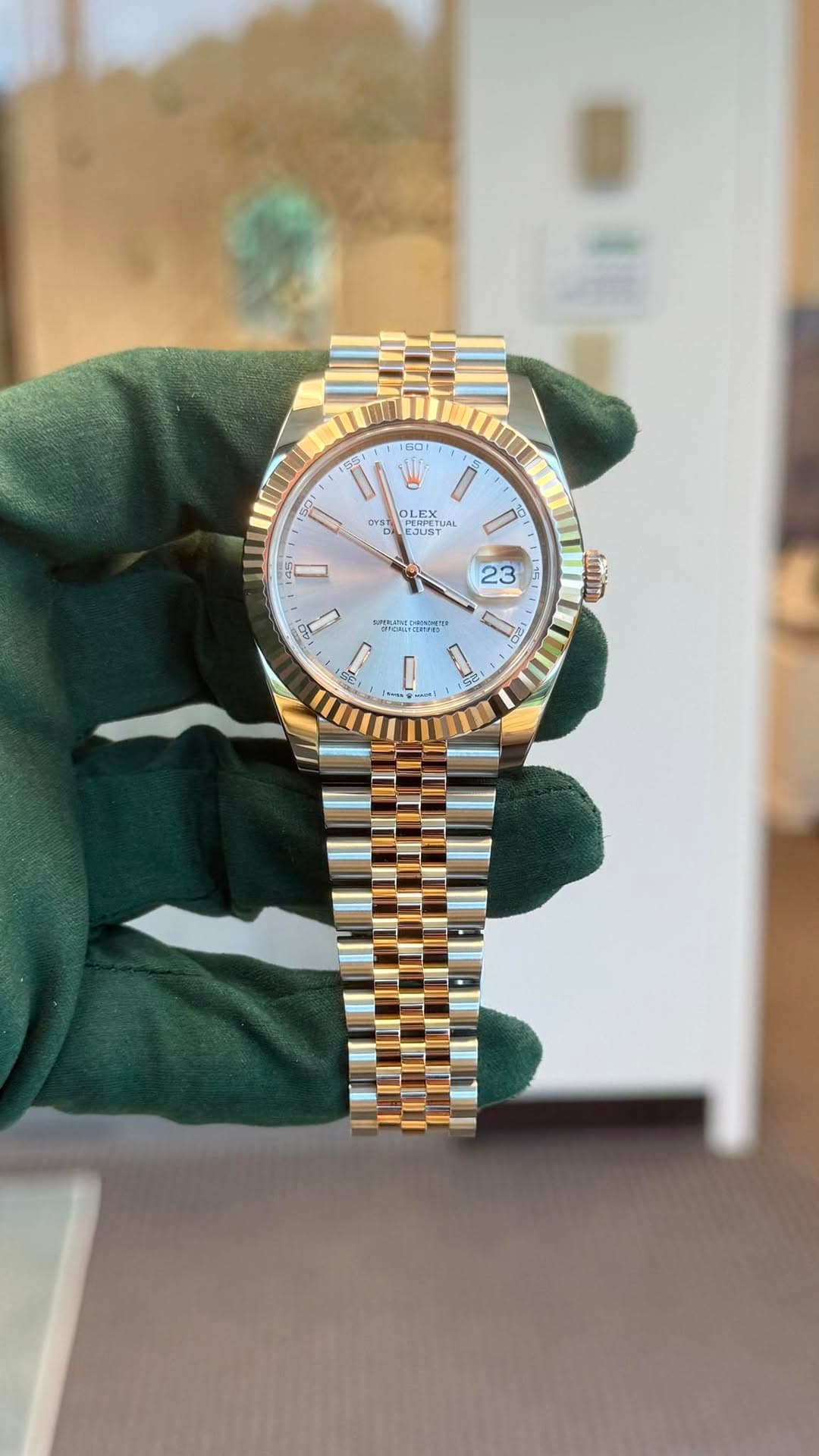 May be an image of wrist watch and text
