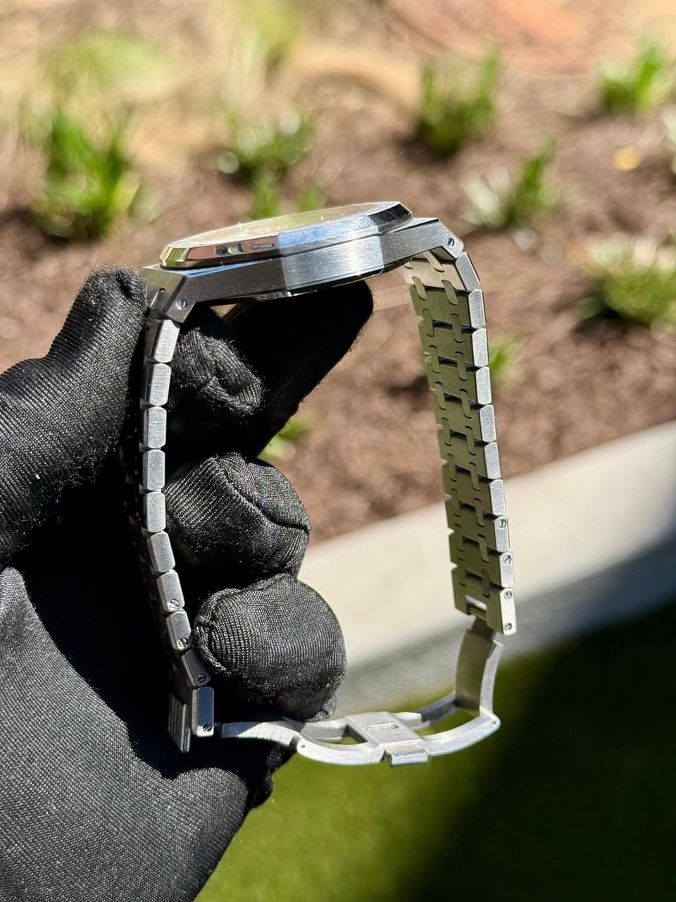 May be an image of golf and wrist watch