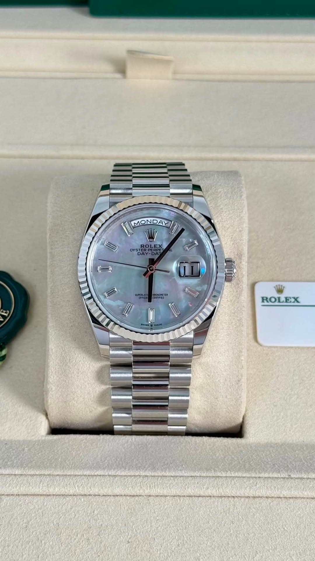 May be an image of wrist watch and text