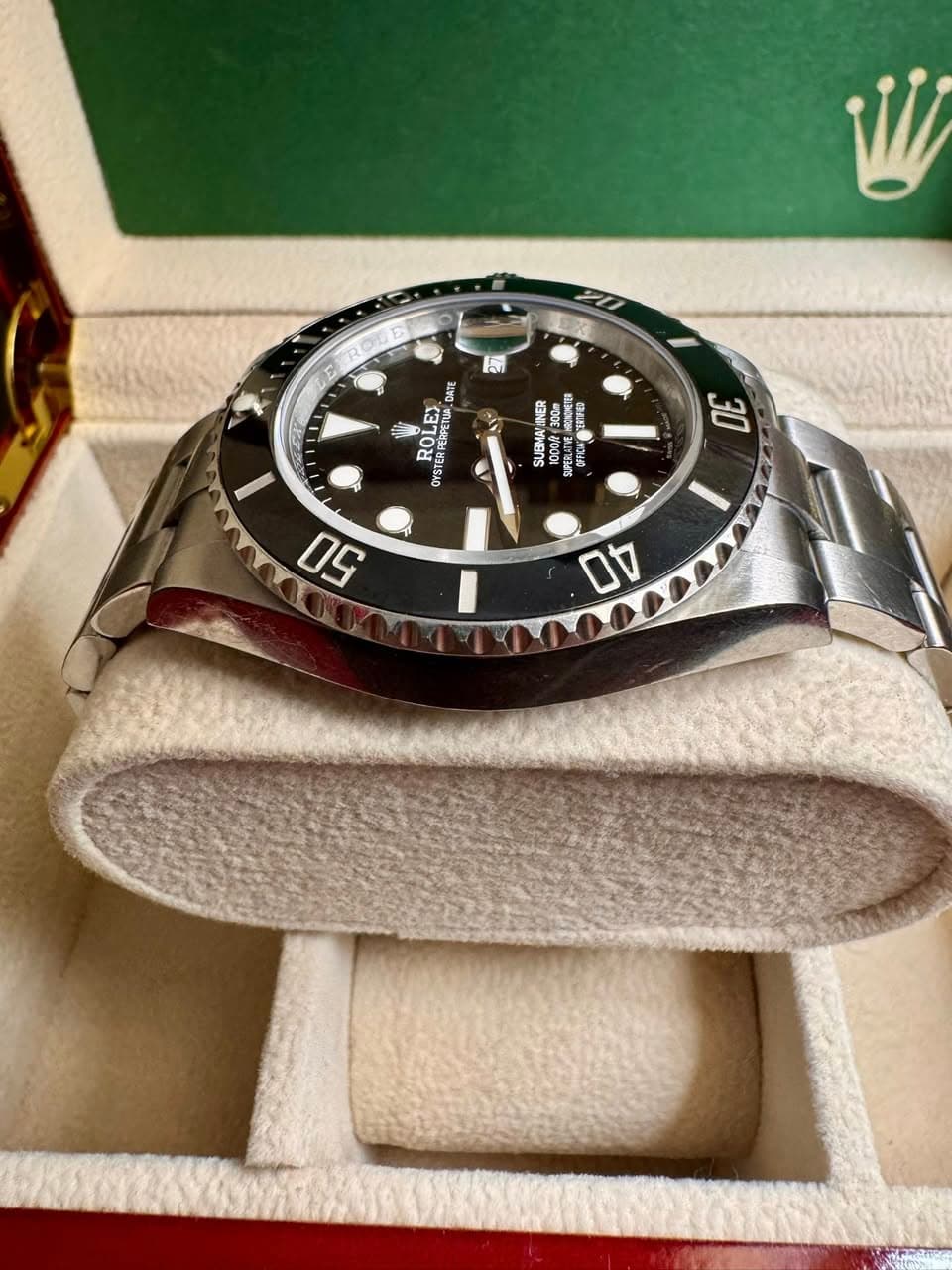 May be an image of wrist watch and text