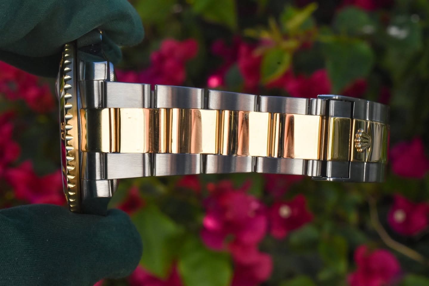 May be an image of wrist watch and text