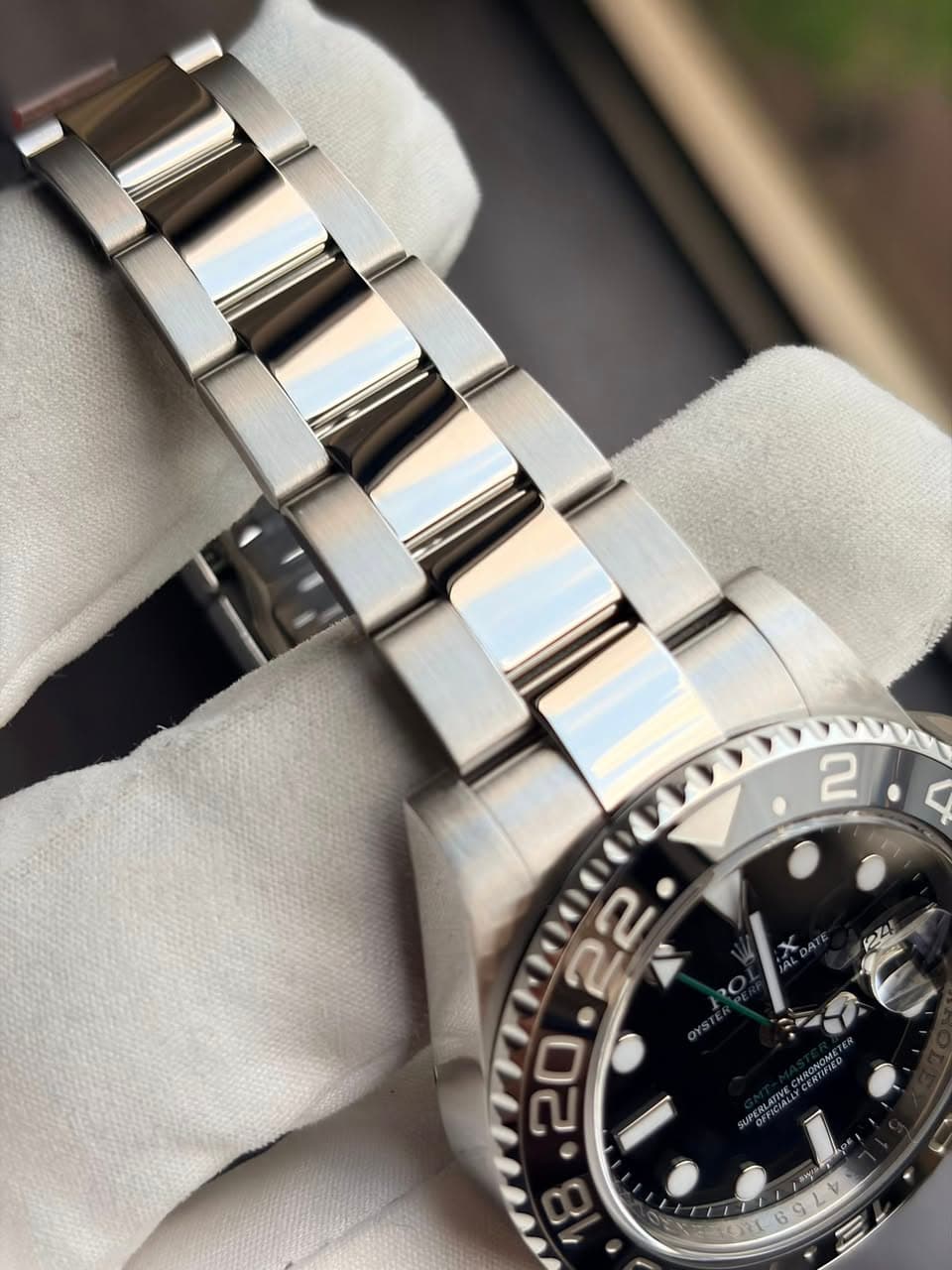 May be an image of wrist watch and text