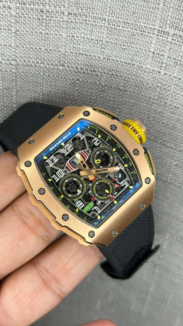 May be an image of wrist watch and text