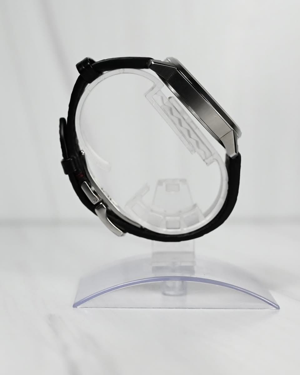 May be an image of wrist watch and text