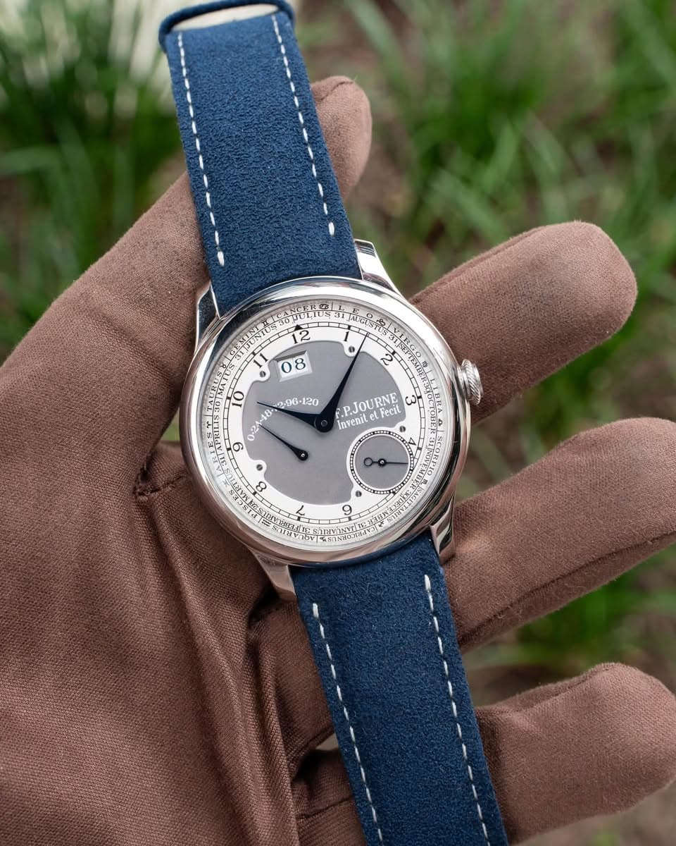 May be an image of wrist watch, leather and text that says 'ANGOS NER 2 08 O 2 To 10 E.PJOURNE cn Invenil te InvenilelFecit Fecit 9 ش σι 8 9'