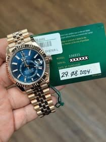 May be an image of wrist watch and text that says '35-0005 elle datée antie aillant officiel Rolex est valable que moment achat aillantofficie nly dated by the antee valid…