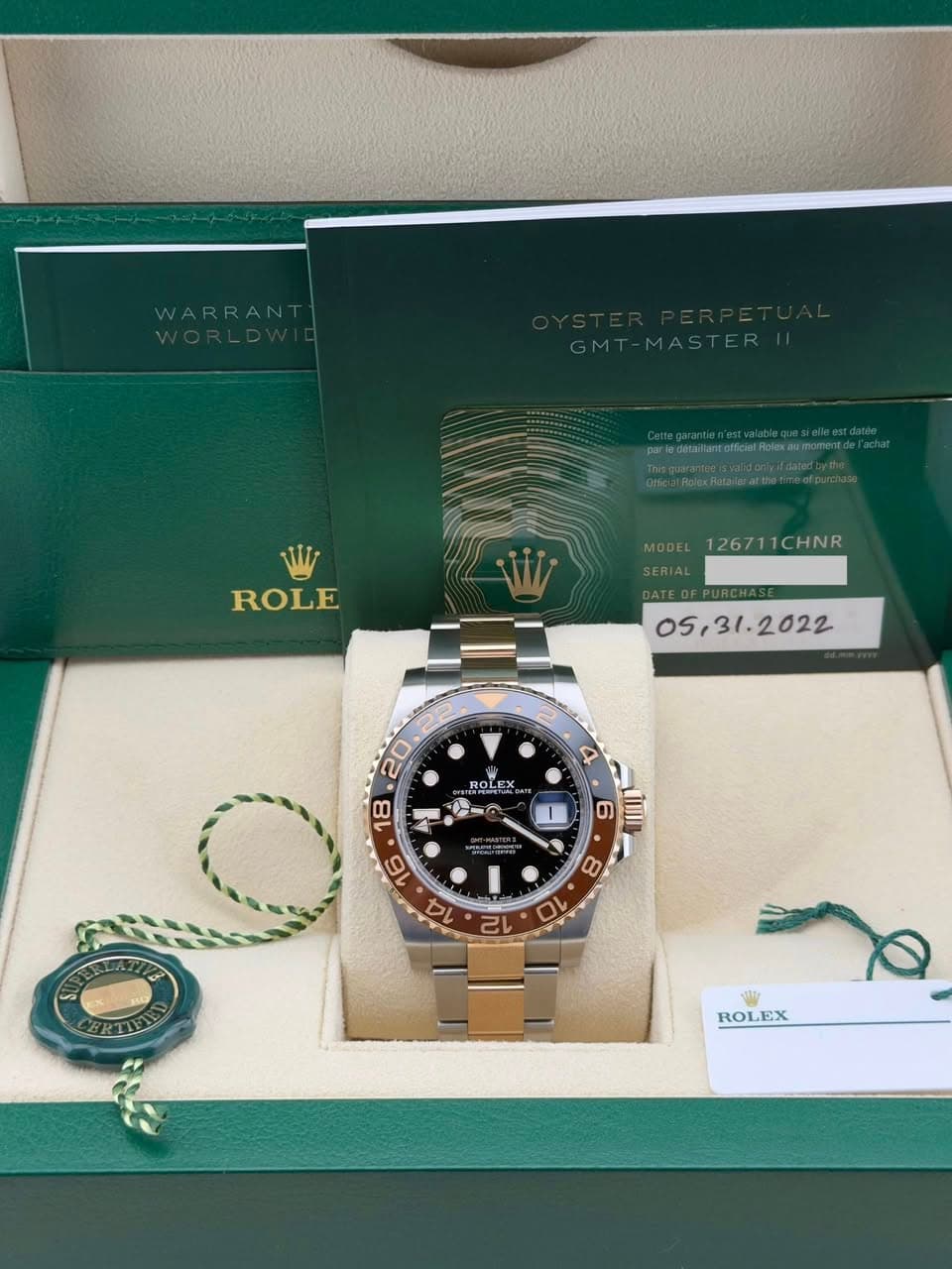 May be an image of wrist watch and text that says 'ROLE 126711CHNR 12671 1CHNR 05, , ROLEX DLEX 18 A 人 美 16 14 I 6 TII 8 10 လ ROLEX'