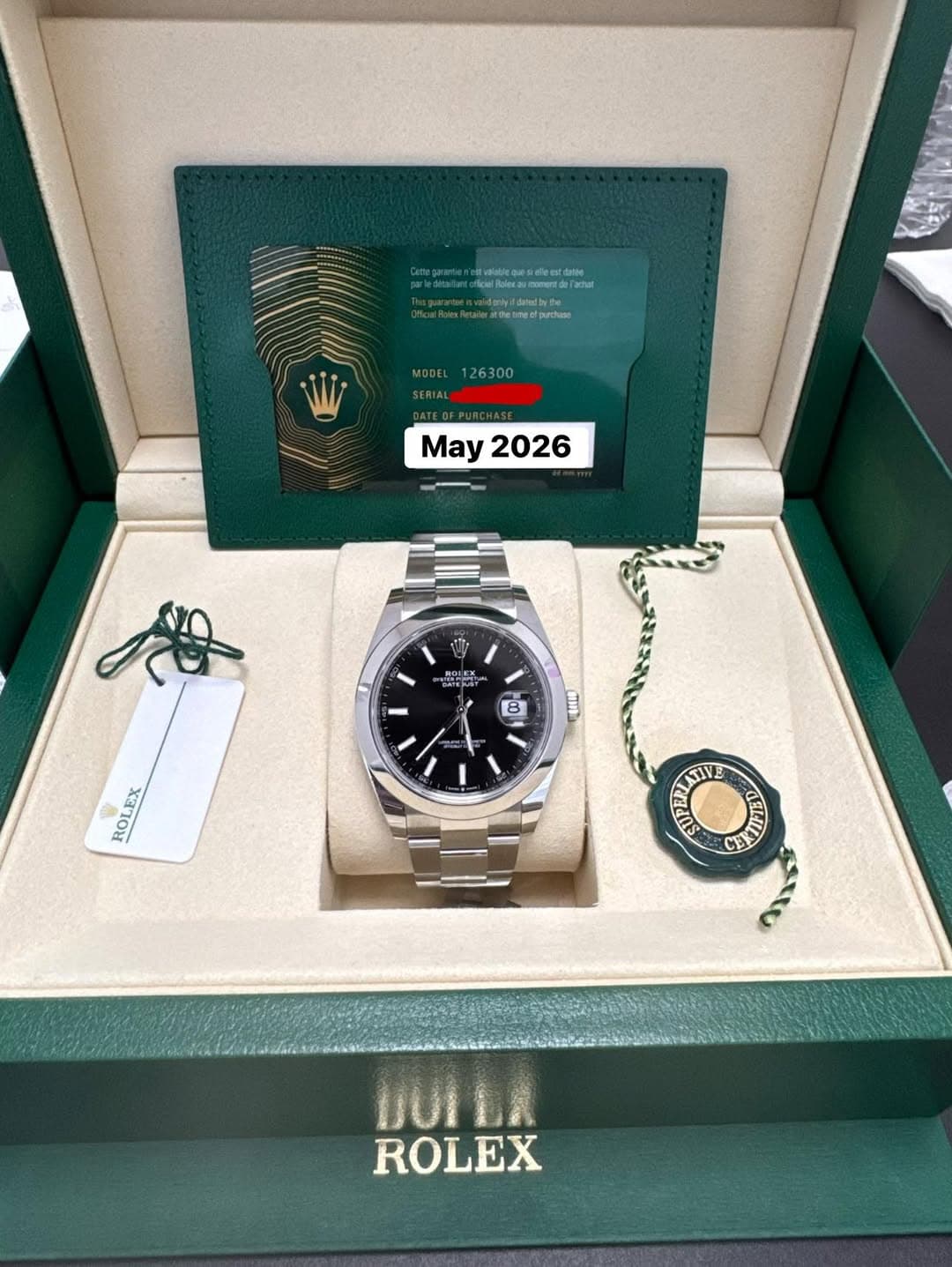 May be an image of wrist watch and text that says 'e 126300 May May2026 2026 SA 吉2 ROLEX SY W 超料車 8 - ROLEX SUPERL CATILTED ዜ DUILA ROLEX'