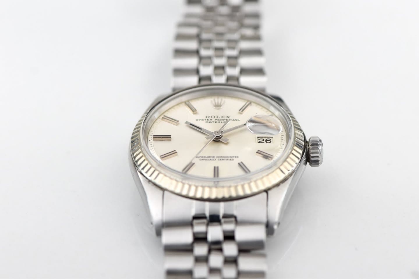 May be an image of wrist watch and text