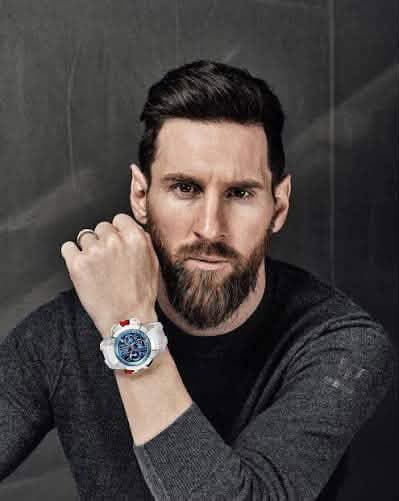 May be an image of one or more people, beard and wrist watch