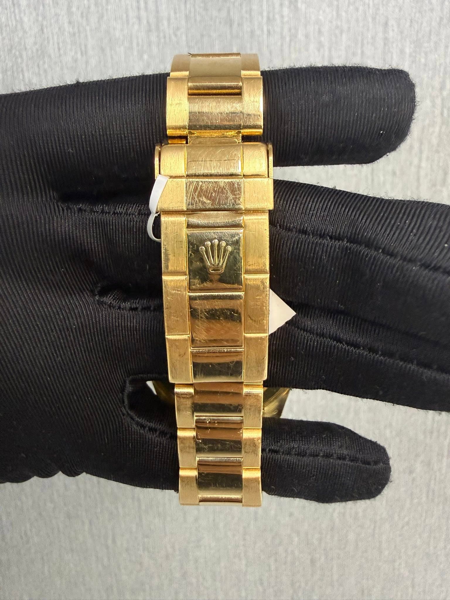 May be an image of wrist watch