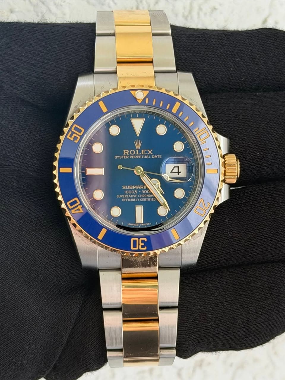 May be an image of wrist watch and text that says '50 ROLEX OYSTER OYSTERPERPETUALDATE STERPERI PERPL ETUAL DATE 10 e. 4 SUBMARI 1000f R=300 -300 dane HRONGE D0N 300 CONTeE…