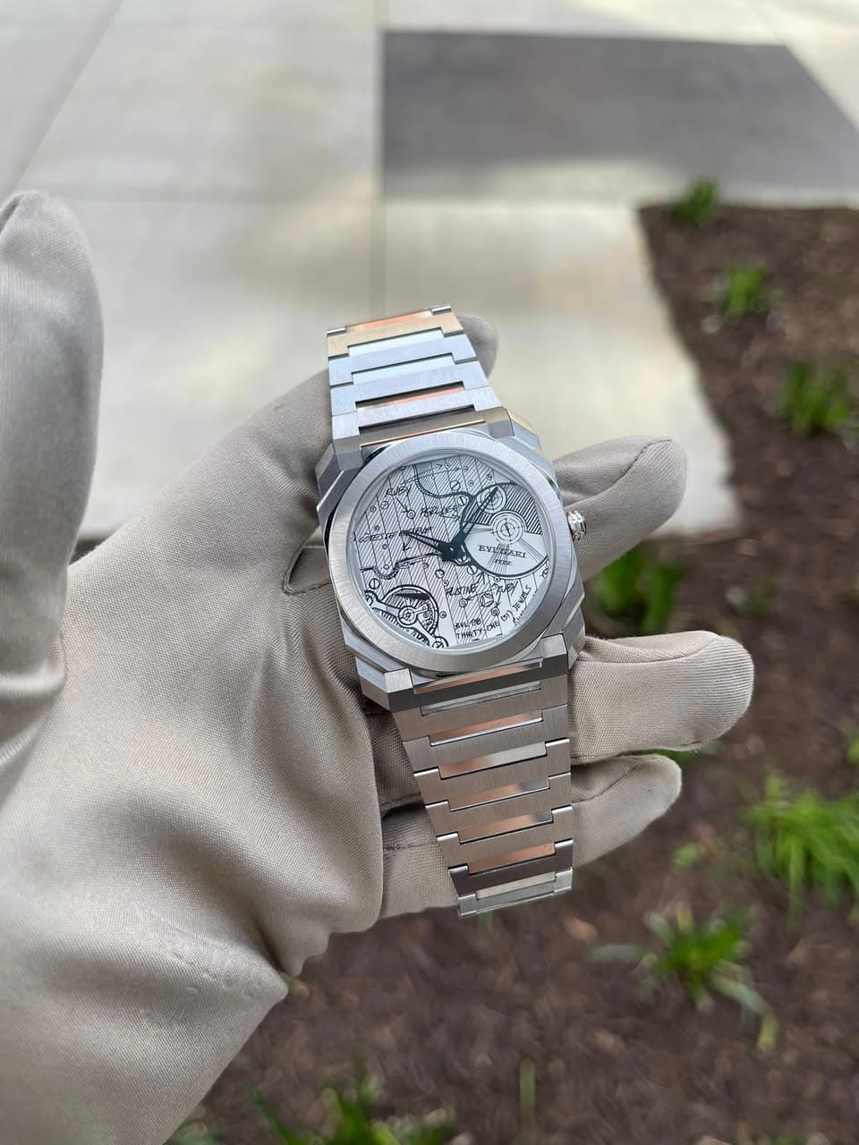 May be an image of wrist watch and text