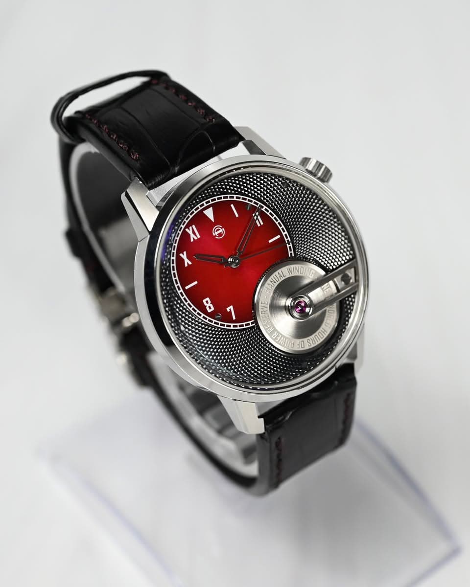 May be an image of wrist watch and text