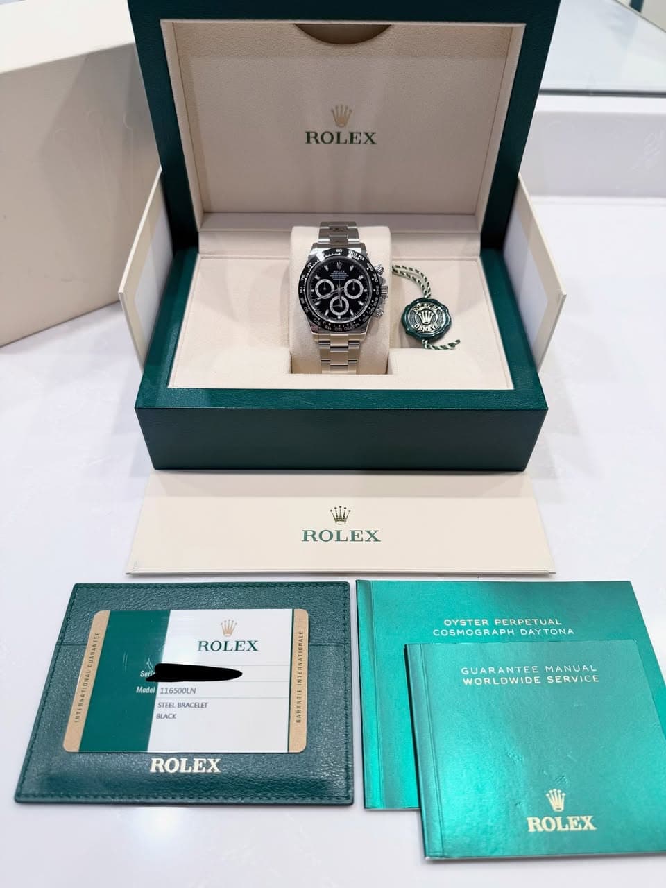 May be an image of wrist watch and text that says 'ROLEX SNSNNA 生おん T . ROLEX BARESTIL ROLEX EX รส์ 116500LN BRACELET BLACK COSMO GRAPH OYSTERPERETUAL OYSTER PERPETUAL COSMOGRAPH…