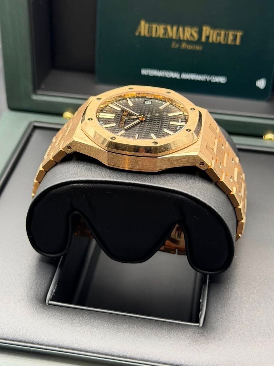 May be an image of wrist watch and text