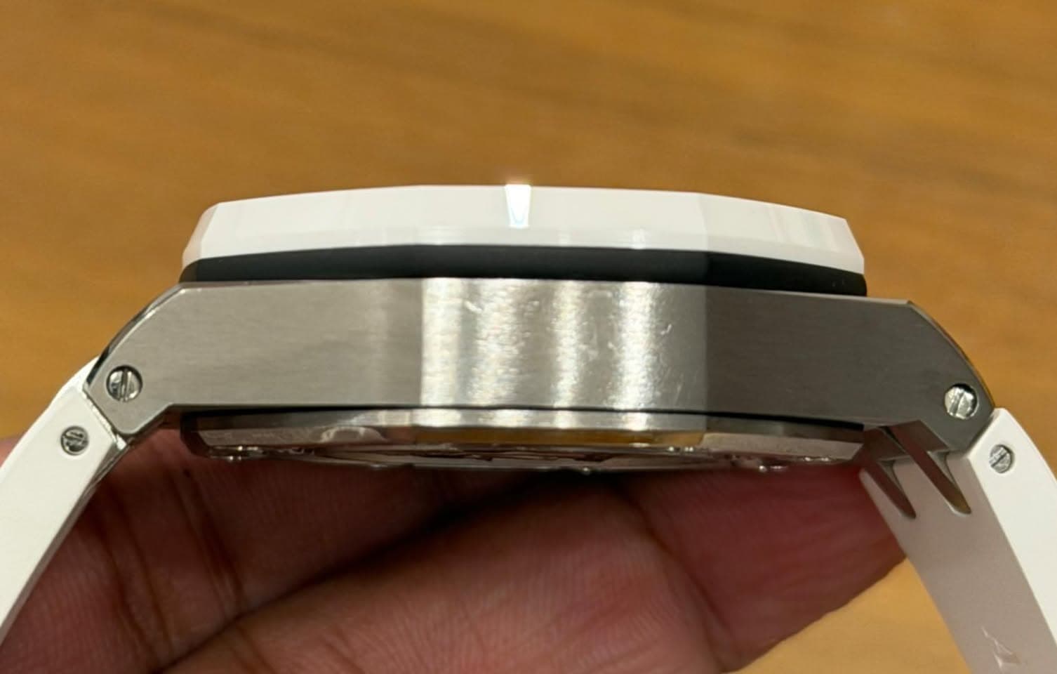 May be an image of wrist watch and knife