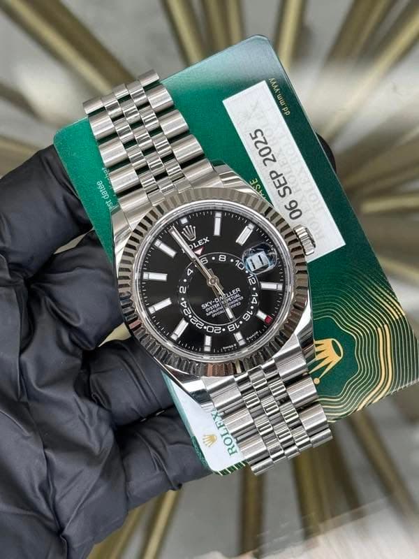 May be an image of wrist watch and text