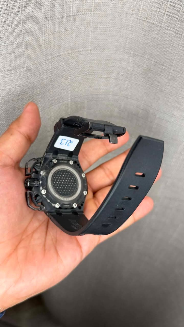 May be an image of digital watch and text