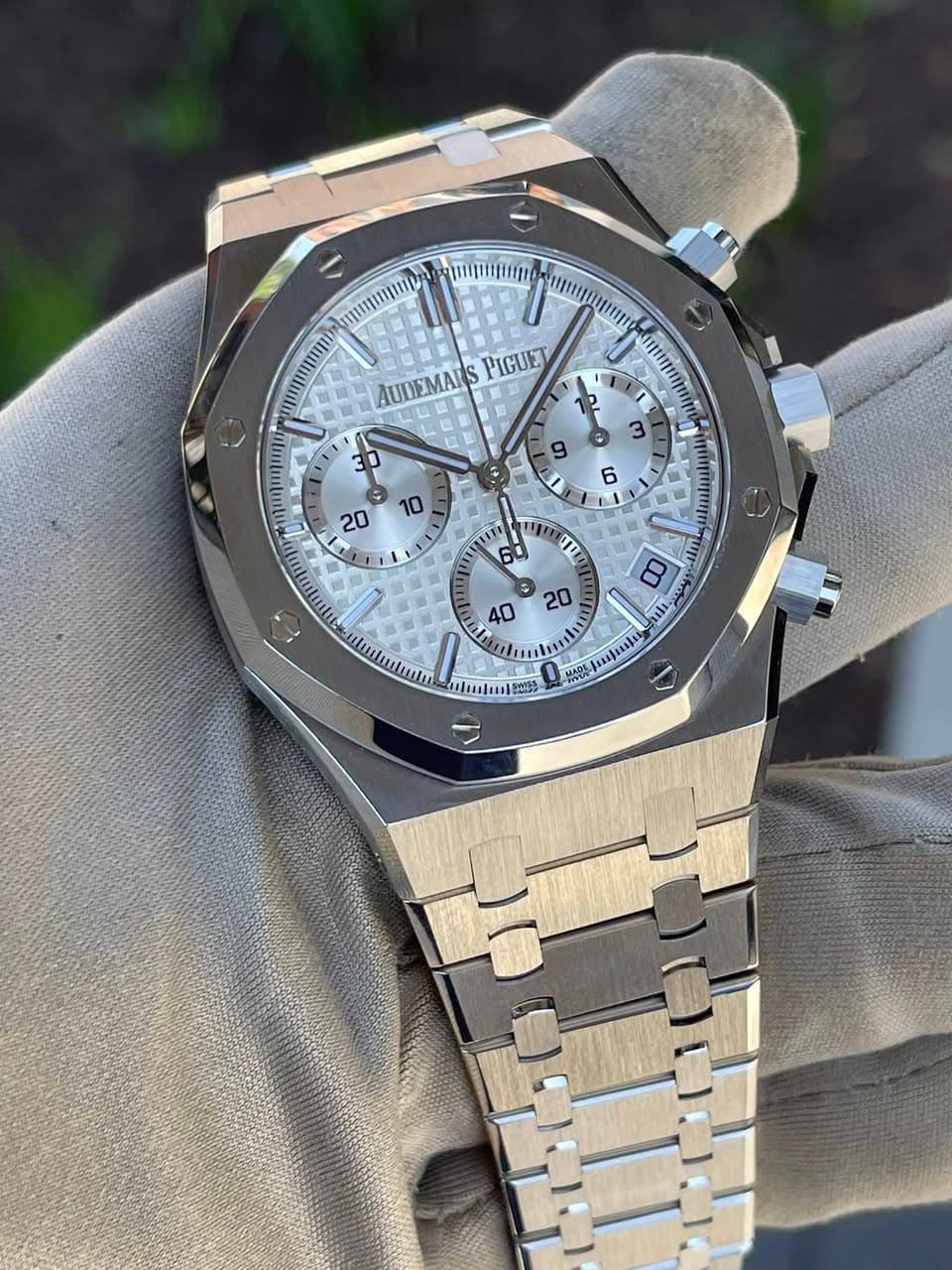 May be an image of wrist watch and text