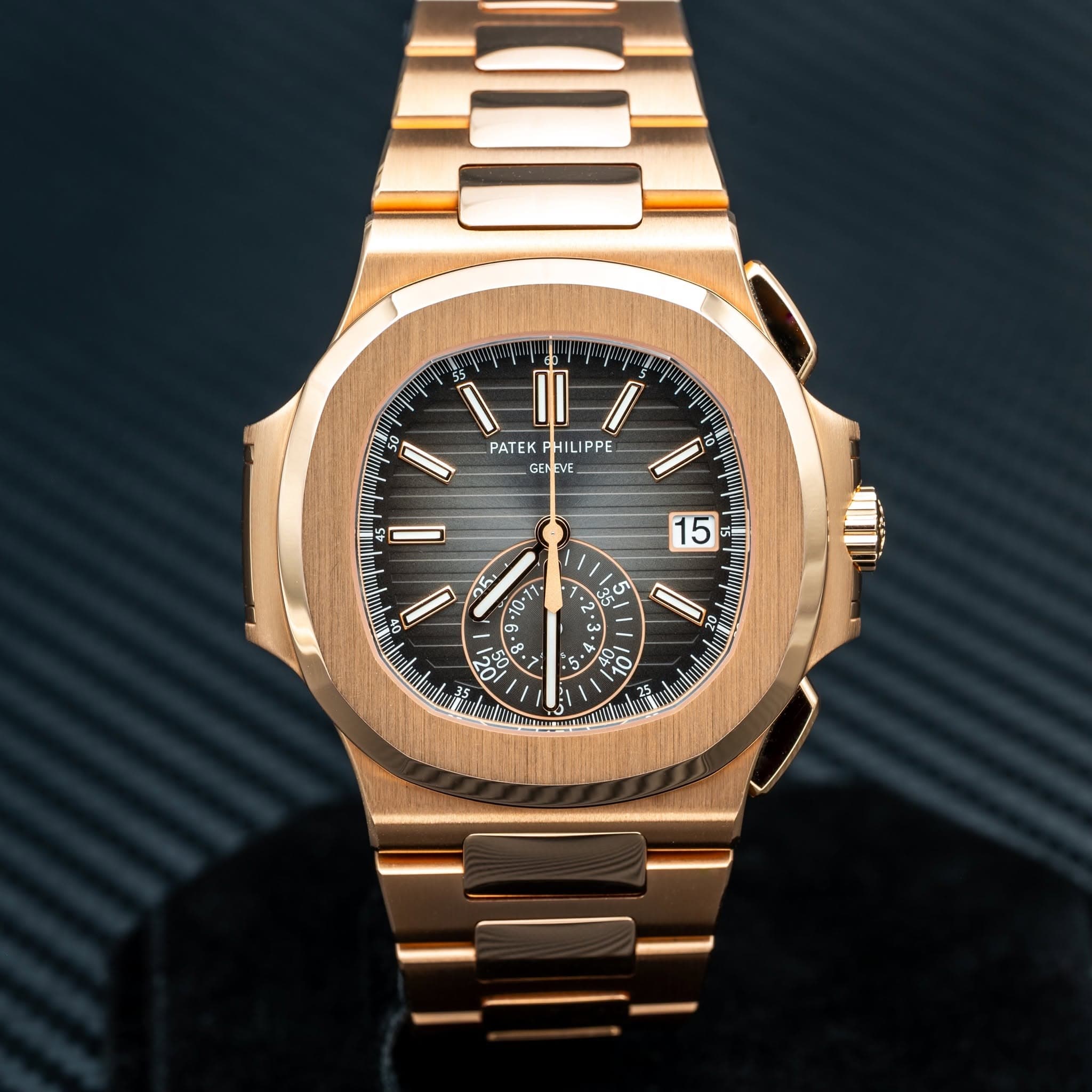 May be an image of wrist watch and text
