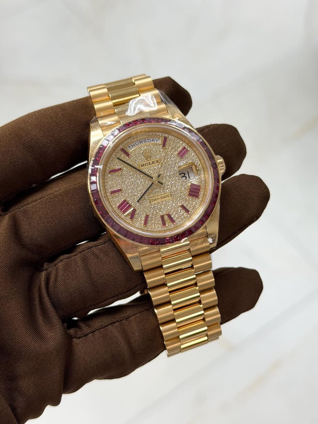 May be an image of wrist watch and text