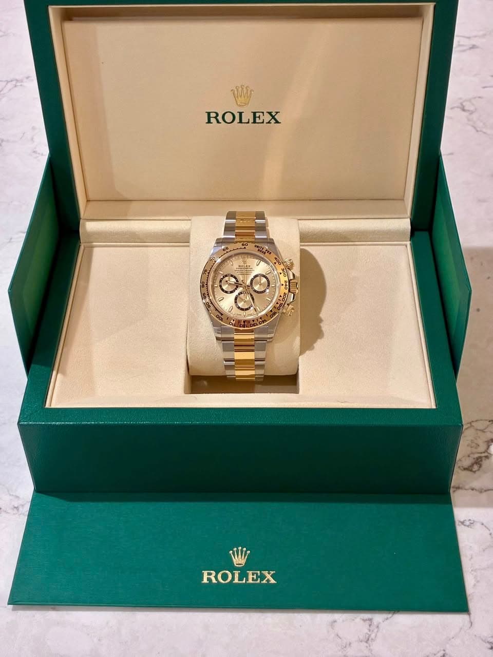 May be an image of wrist watch and text that says 'ROLEX ROLEX'
