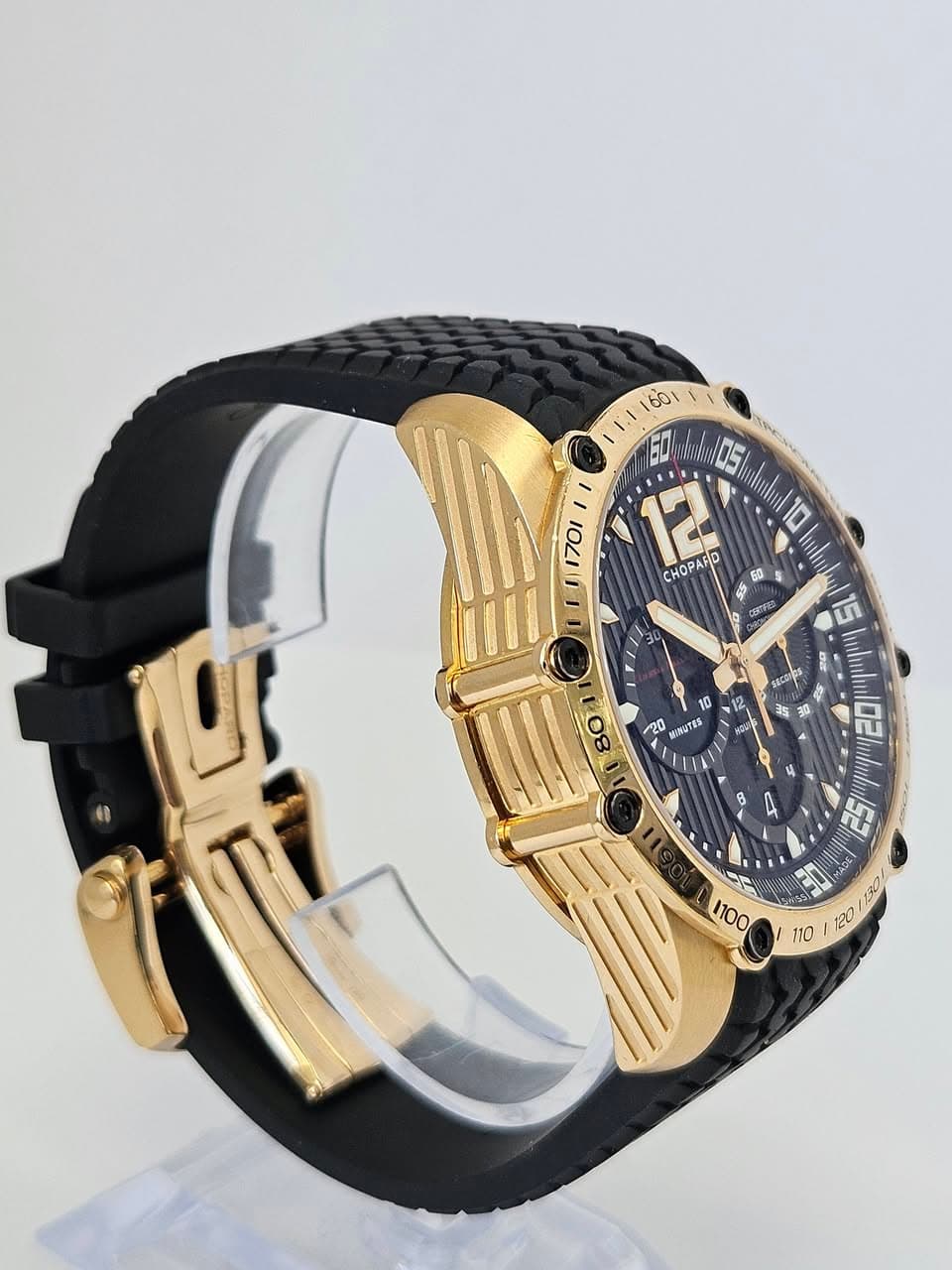 May be an image of jewelry, digital watch and text