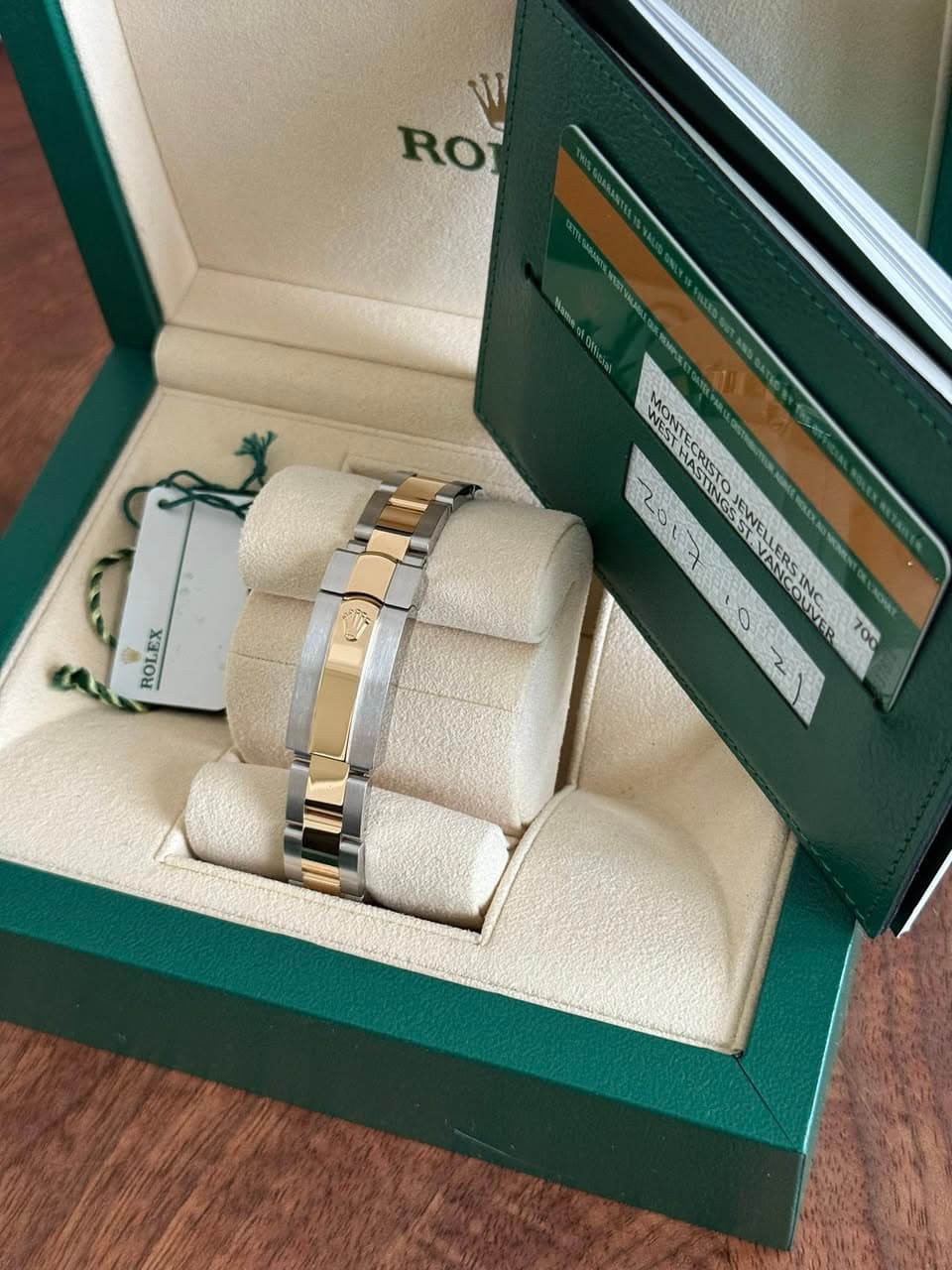 May be an image of ring, wrist watch and text