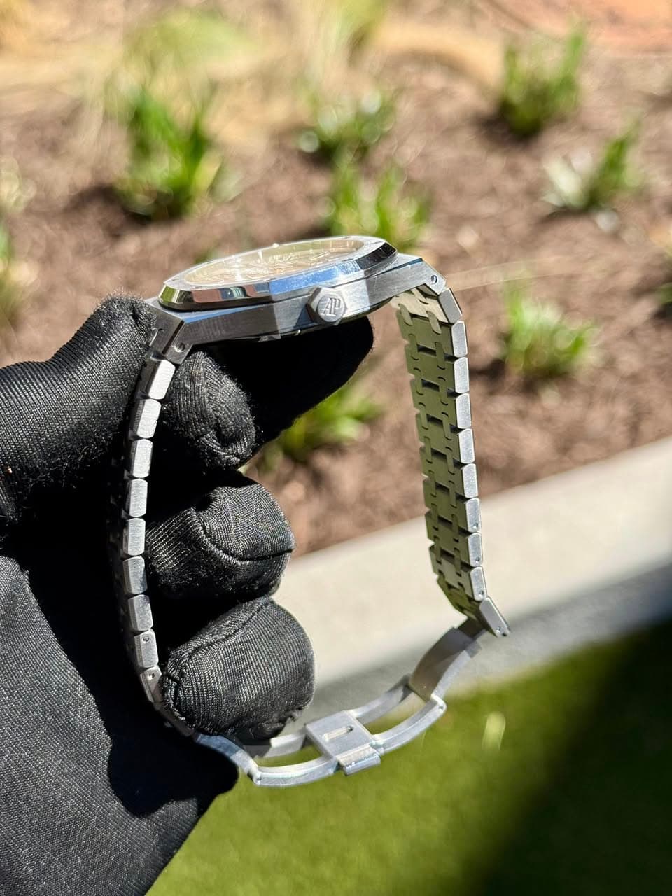 May be an image of golf, digital watch, golf course and text