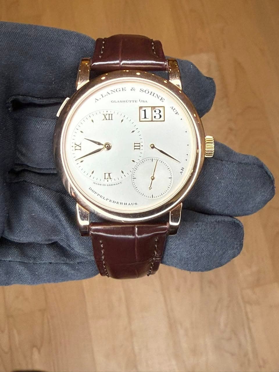 May be an image of wrist watch and text